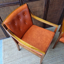 Load image into Gallery viewer, 2 VINTAGE BLACKWOOD AND AMBER VINYL ARMCHAIRS BY BENDIX. PRICE IS EACH.