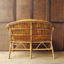 Load image into Gallery viewer, VINTAGE CANE SETTEE WITH ORIGINAL CUSHION