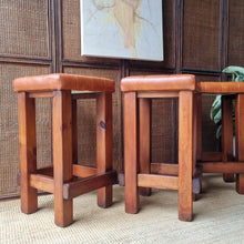 Load image into Gallery viewer, SET OF 3 VINTAGE CHUNKY PINE &amp; VINYL KITCHEN COUNTER STOOLS
